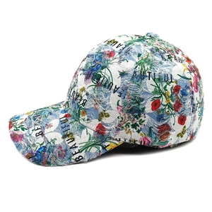 Close-up of distressed floral baseball cap with frayed edges and beautiful text print