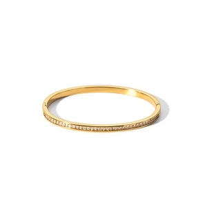 Bracciale rigido minimalista in acciaio al titanio placcato oro 18k con zirconi bianchi