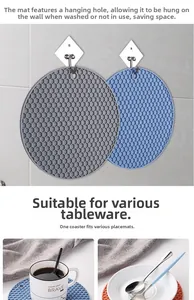 Detail showing hanging storage hole and honeycomb pattern on grey silicone placemat