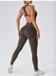 Detail view of deep brown backless yoga bodysuit with cross-back design and slim fit