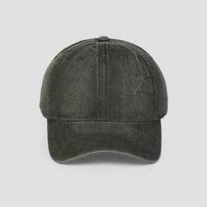 Close-up of vintage washed grey denim baseball cap showing fabric texture and visor