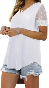 Detail of white V-neck T-shirt showing delicate lace embroidery and mesh patchwork sleeves