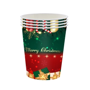 Stack of red and green Merry Christmas disposable paper cups for festive party decoration
