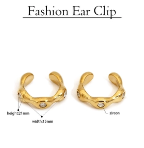 Detail view of 21mm x 15mm gold-plated zircon ear clips with irregular wave texture