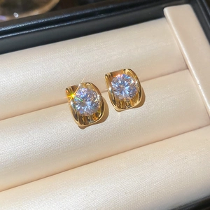 18k gold plated silver earrings with sparkling oval zircon stones in a jewelry box