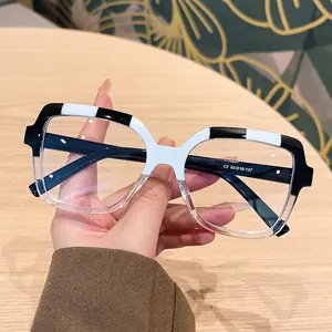 Modern oversized square anti-blue light glasses with black and white color-block frames