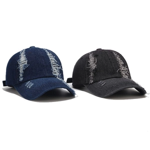 Distressed denim baseball caps in dark blue and black with vintage frayed street style
