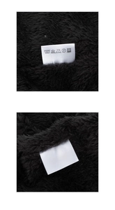 Detail shot of the black plush lining and 100% acrylic fabric label for winter beanie