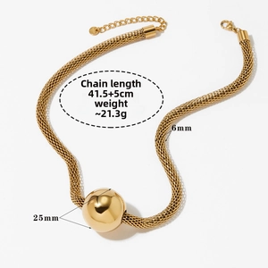 Detailed macro of 6mm woven gold mesh chain with lobster clasp and extension links