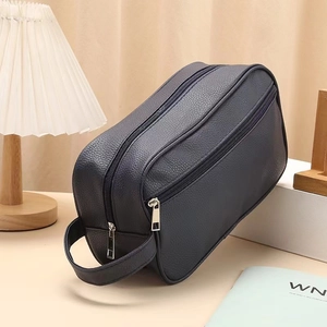 Large capacity navy blue PU leather toiletry bag with double zippers and top handle
