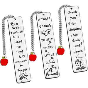Three stainless steel teacher bookmarks with apple charms and engraved inspirational quotes