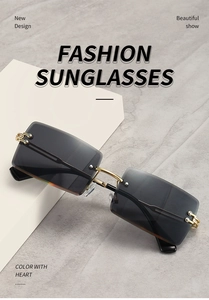 Detail of rimless square sunglasses with grey gradient lenses and gold metal hinges