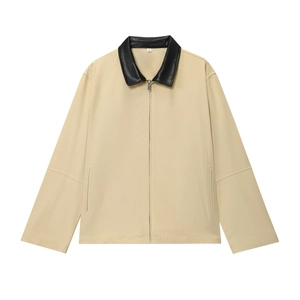 Veste beige pour femme avec col en cuir noir, vue de face à plat, mode urbaine