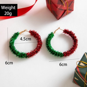 Detailed view of festive Christmas wreath hoop earrings with 6cm size and weight specs