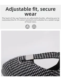 Détail d'une casquette pied-de-poule avec boucle arrière réglable en métal argenté