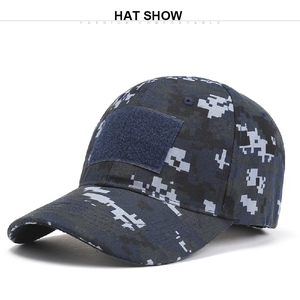 Detail view of digital camo baseball cap with a front hook and loop patch area