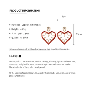 Detailed size chart for oversized red heart earrings with crystals and golden copper frames