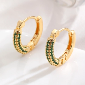 Star copper earrings with green cubic zirconia in a gold hoop style for men and women