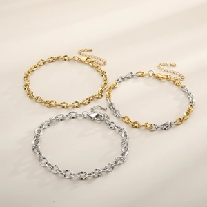 Three-piece set of twisted oval link anklets in gold, silver, and bicolor stainless steel