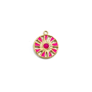 Detail of 14k gold plated compass pendant with pink enamel and center stone inlay