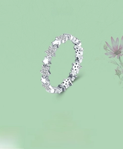 Close-up of S925 sterling silver ring with polished and cubic zirconia star pattern