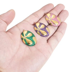 Enamel oval flower pendants with center rhinestones in green, purple and pink