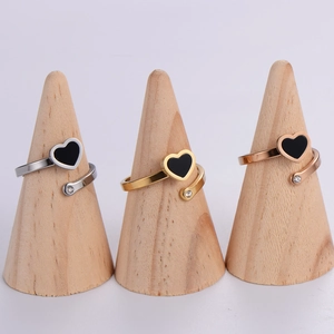 Three-piece stainless steel open heart ring set in silver, gold, and rose gold finishes