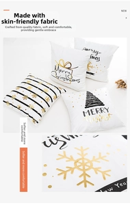 Macro shot of gold foil Christmas tree patterns on soft white festive pillowcases