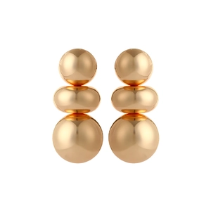 Detail of gold geometric earrings with three stacked metallic spheres in mirror finish