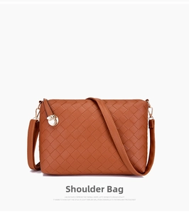 Close-up of brown woven texture shoulder bag with gold round metal twist lock detail