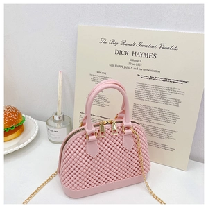 Pink jelly shell bag with bubble texture, gold hardware and detachable chain strap