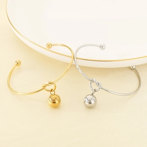 Minimalist open gold and silver stainless steel bangles with hollow sphere pendant