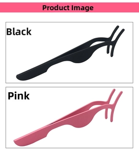 Detailed comparison of pink and black eyelash applicators for precise makeup application