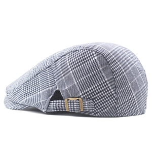 Casquette gavroche classique à carreaux noir et blanc avec boucle métal vintage