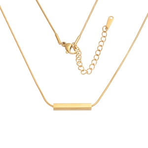 Detailed macro view of gold hollow rectangular bar pendant with fine snake chain jewelry
