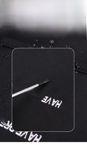 Détail du tissu noir imperméable et résistant aux déchirures avec texture sergée dense