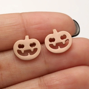 Roségoldene hohle Kürbis-Ohrstecker für Halloween mit Jack-o'-lantern-Gesichtsmotiv