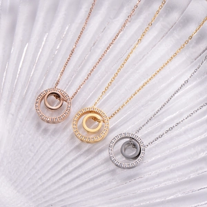 Three-color interlocking circle necklaces in rose gold, gold and silver finishes with zircons