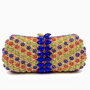 Detailed close-up of colorful rhinestones and floral crystal patterns on the evening clutch
