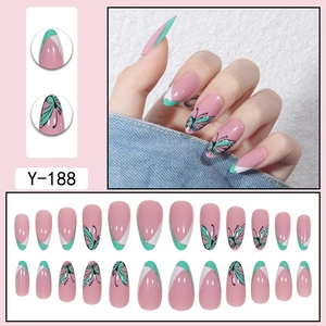 Almond press-on nails with butterfly glitter design and French tip in pink and green