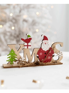 Vue détaillée du décor de table XMAS en bois avec Père Noël et petit oiseau rouge