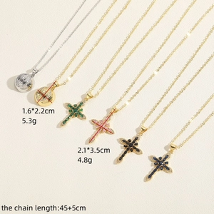 Vintage necklace set with colorful zircon cross and Virgin Mary pendants on beige base