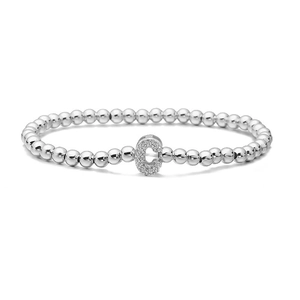 Detail of silver beaded bracelet featuring a sparkling cubic zirconia letter C pendant