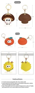 Détail des porte-clés fruits en dessin animé avec dimensions et miroirs de poche intégrés