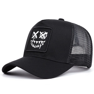 Street style black trucker hat with monster embroidery and breathable mesh back