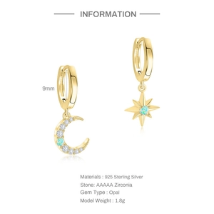 Detailed view of S925 silver moon and star earrings with opal and zircon in gold finish