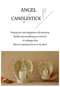 Detail view of angel prayer resin candle holders in vintage white for home decor