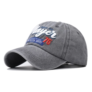Close-up of premium washed cotton texture with Player 76 3D embroidery on baseball cap