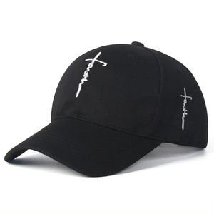 Black cotton baseball cap with white faith cross embroidery on a minimalist crown