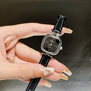 Minimalist square watch for women with black leather strap and sparkling silver dial details